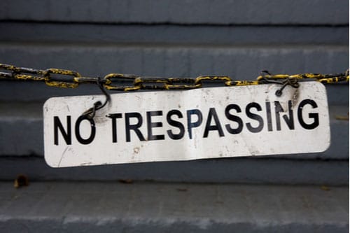 No trespassing sign, trespassing charges concept