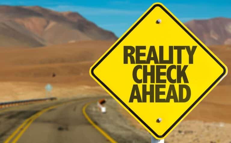 This ismage is of a yellow road sign that says 'reality check ahead'. Concept of 6 common myths on how to beat a breathalyzer test